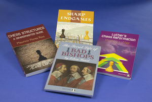 Four colourful bookcover designs, clockwise from left, a book in shades of brown showing a brick wall with a pawn shape cut into it, like a cartoon mouse hole. Next a yellow cover showing two pawns as tightrope-walkers high above city skyscrapers – when their tightropes cross, one of them will fall, which refers to the title “Sharp Endgames”. Next a royal purple cover showing a pawn in front of multi-coloured upward-pointing arrows – in the clouds above a chess king can faintly be seen. Lastly at the front, “The Secret Life of Bad Bishops”, which apparently shows a classical painting of three bishops, though it’s actually a triple portrait of Cardinal de Richelieu. (Colorful, multi-coloured, book cover, book-cover.)